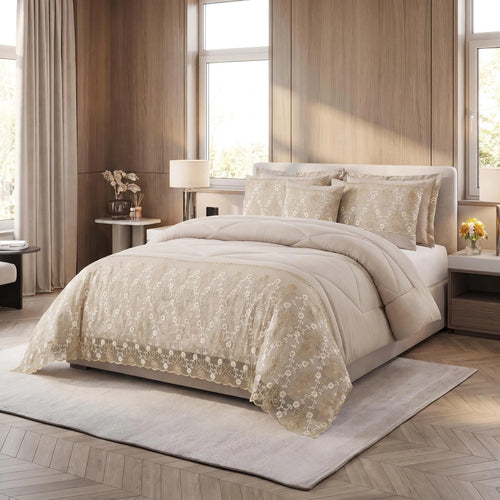 Beige floral embroidered 3-piece comforter set styled in a bedroom