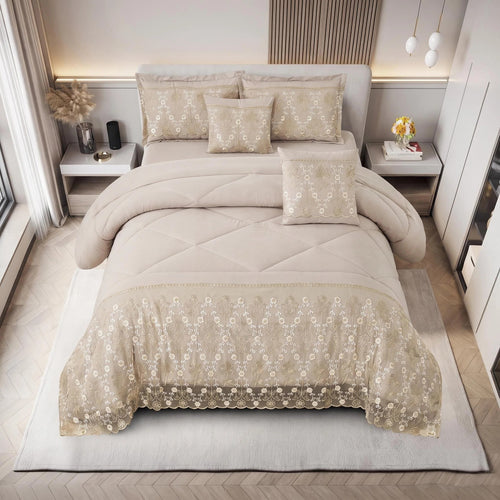 Overhead view of the beige embroidered comforter set